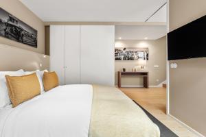 Ein Bett oder Betten in einem Zimmer der Unterkunft 108MM House