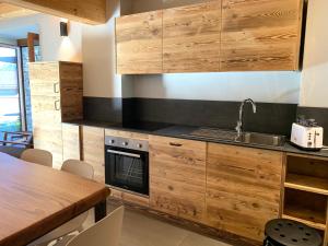 Kuchyň nebo kuchyňský kout v ubytování Chalet Del Sole