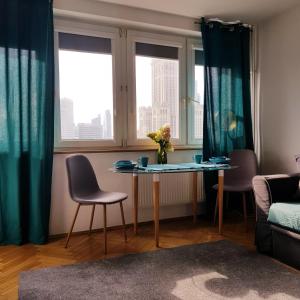 Posedenie v ubytovaní DELUXE WIDOK 24 APARTMENT