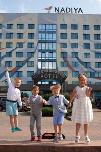 a group of children standing in front of a hotel at Nadiya Hotel in Ivano-Frankivsk