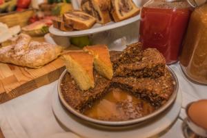 a table with a plate of bread and toast at Sea View Village in Vasilikos