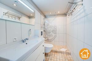 Kúpeľňa v ubytovaní Apartamenty Promenada Gwiazd 28 - visitopl