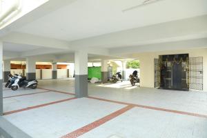 Fitness centrum a/nebo fitness zařízení v ubytování KANS ONE - Madipakkam