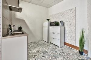 Kuchyň nebo kuchyňský kout v ubytování Appartement L'Elégant Chalonnais - Hyper-Centre + 5 fotografií