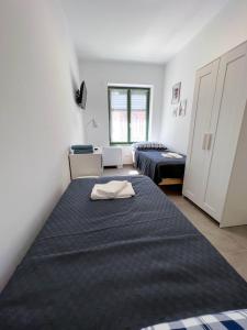 Letto o letti in una camera di Lujza Apartman