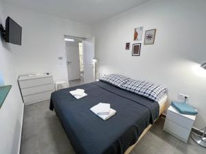 Letto o letti in una camera di Lujza Apartman