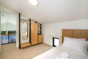 A bed or beds in a room at Fairytale Villas