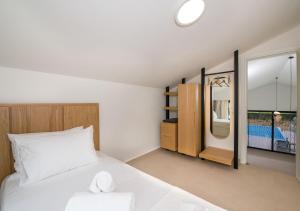 A bed or beds in a room at Fairytale Villas