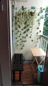 a room with a wall with plants on it at CG's place (modern condo in cdo) in Cagayan de Oro
