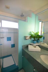 Koupelna v ubytování Charmant studio au Carayou avec piscine et spa + 3 fotografie