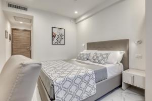 Posteľ alebo postele v izbe v ubytovaní Vomero High Hotel