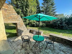 Zahrada ubytování Gîte avec piscine intérieur, Le Repère de Choiseau