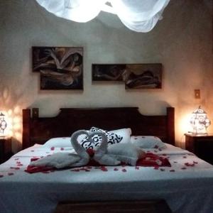 Cama ou camas em um quarto em Vista Linda Hotel