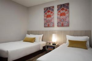 Letto o letti in una camera di Citadines Uplands Kuching