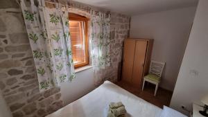 Posteľ alebo postele v izbe v ubytovaní Rotondo Apartments