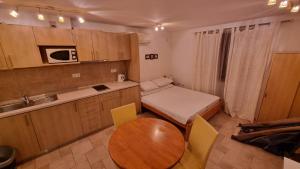 Kuchyňa alebo kuchynka v ubytovaní Rotondo Apartments