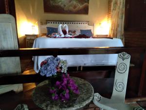 Cama ou camas em um quarto em Vista Linda Hotel mais 37 fotos