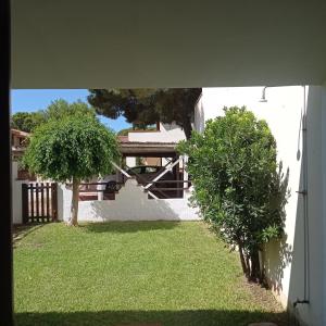 A garden outside Margherita Holiday House
