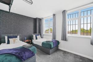 Postel nebo postele na pokoji v ubytování Cosy 2 Bed- Gillingham
