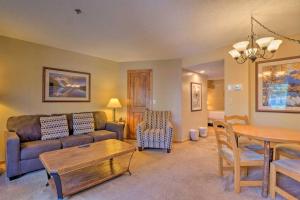 a living room with a couch and a table at Beaver Run Resort Studio in Breckenridge