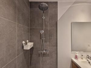a bathroom with a shower and a sink at Appart-Hotel Léopold Liège Centre in Liège +121 photos