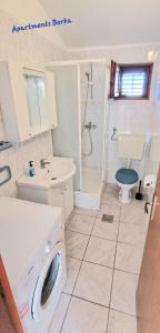 Kúpeľňa v ubytovaní Apartments Borka