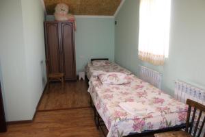 Ein Bett oder Betten in einem Zimmer der Unterkunft Runada B&B