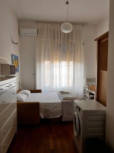 A bed or beds in a room at Abbrescia 50