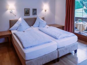 Postel nebo postele na pokoji v ubytování Haus Amberger