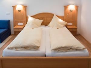 Postel nebo postele na pokoji v ubytování Haus Amberger