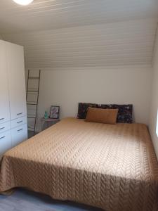 Postel nebo postele na pokoji v ubytování Olgas apartment