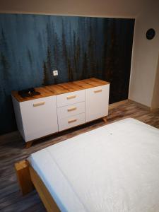 Posteľ alebo postele v izbe v ubytovaní Maciejówka
