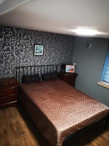 Llit o llits en una habitació de Maciejówka
