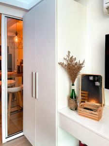 Dapur atau dapur kecil di Downtown Nook - Azure Urban Resort Residences +12 gambar