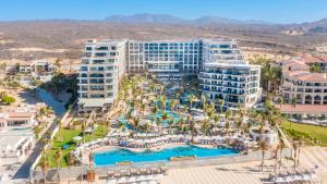an aerial view of a resort with a pool at Villa La Valencia Beach Resort & Spa Los Cabos in San José del Cabo