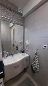 Kúpeľňa v ubytovaní DISZTINGVÁLT Apartman, free garage