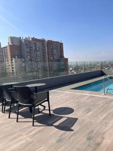 Swimmingpoolen hos eller tæt på Exclusivo Departamento Stgo Centro