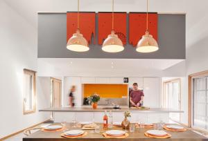 A kitchen or kitchenette at The wood house/La Maison Bois