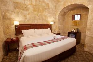 Postel nebo postele na pokoji v ubytování Casa Andina Premium Arequipa
