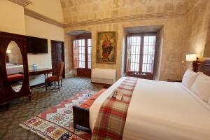 Postel nebo postele na pokoji v ubytování Casa Andina Premium Arequipa