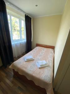 Voodi või voodid majutusasutuse Laine guesthouse toas