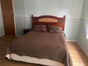 Cama o camas de una habitación en World's End Hostal