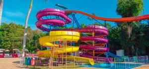 a colorful water slide at a water park at Caldas Park & Hotel Caldas Novas in Caldas Novas