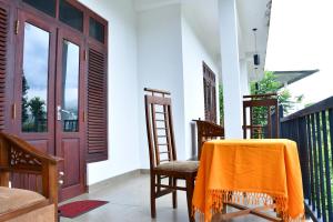 Balkón nebo terasa v ubytování Dilshan Cottage + 24 fotografií