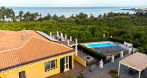 Bazén v ubytování ZAHRA AGRITURISMO nebo v jeho okolí