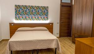 Postel nebo postele na pokoji v ubytování ZAHRA AGRITURISMO