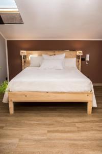 Posteľ alebo postele v izbe v ubytovaní B&B Miellò nelle Langhe