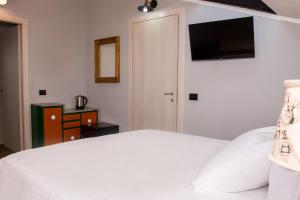 Posteľ alebo postele v izbe v ubytovaní B&B Miellò nelle Langhe