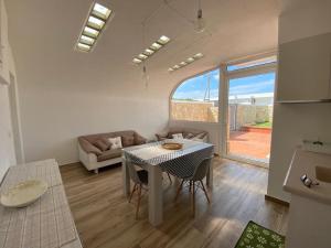 Posezení v ubytování La maison du mar