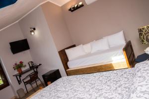 Posteľ alebo postele v izbe v ubytovaní B&B Miellò nelle Langhe